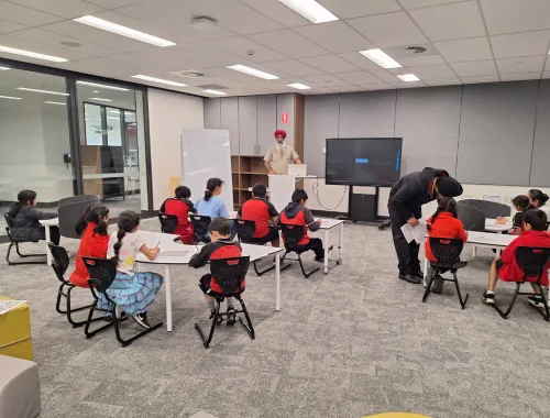 Students attending a supported language school class in Canberra